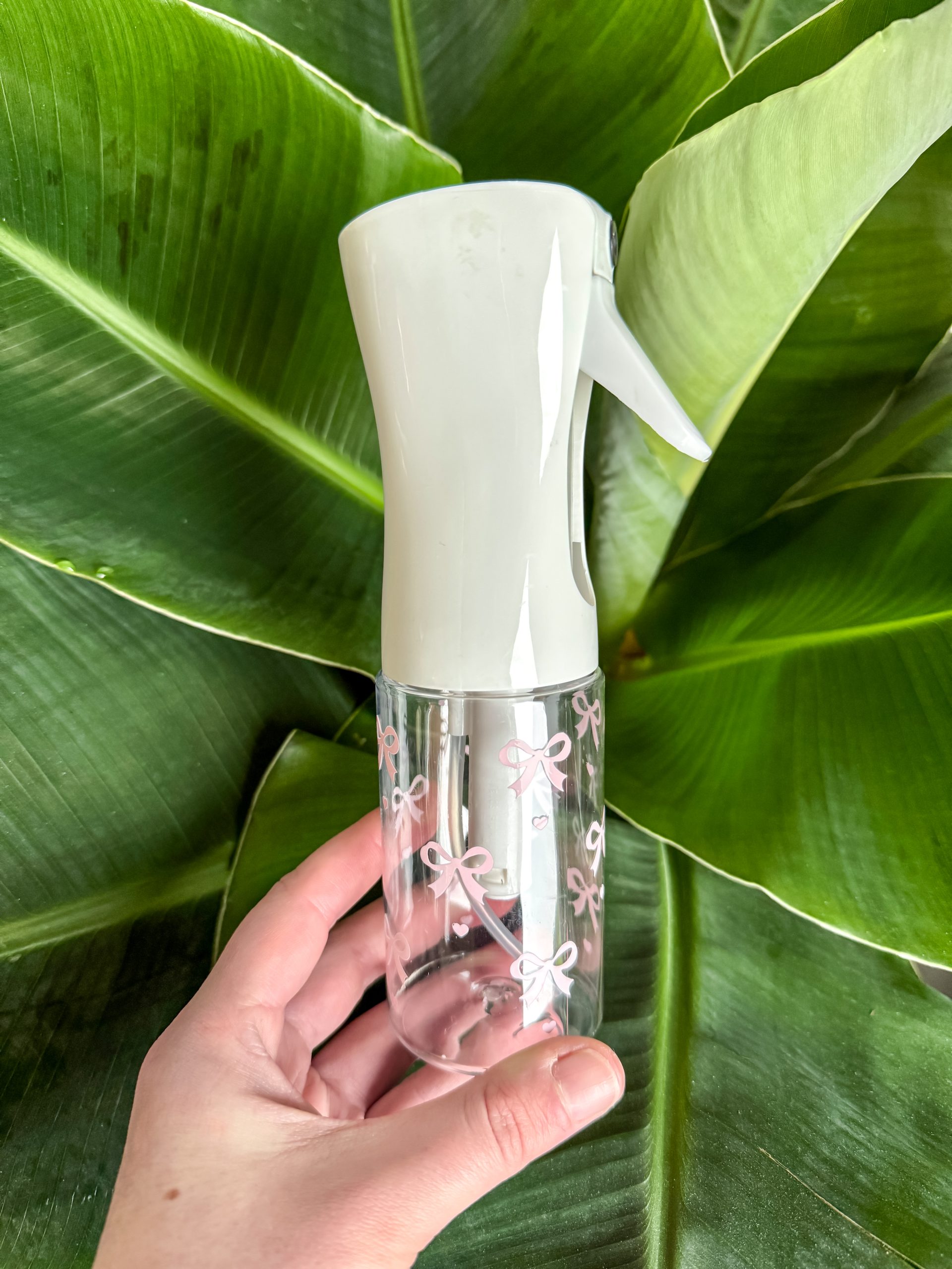 vernevelende spray fles strik