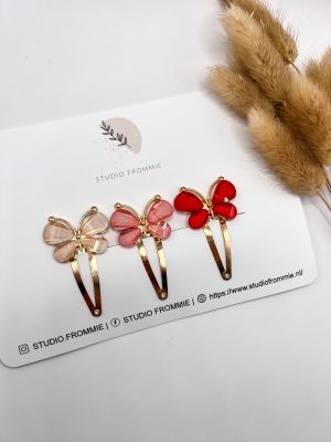 Haarspeldje vlinder. Goud. Roze wit of rood. Klikklak of alligator